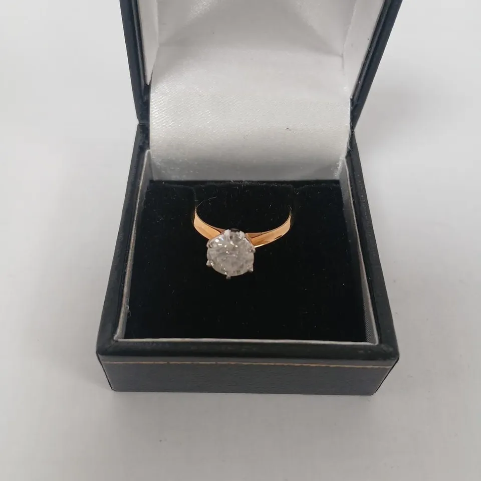 18CT GOLD SOLITAIRE RING SET WITH A NATURAL DIAMOND WEIGHING +1.56CT