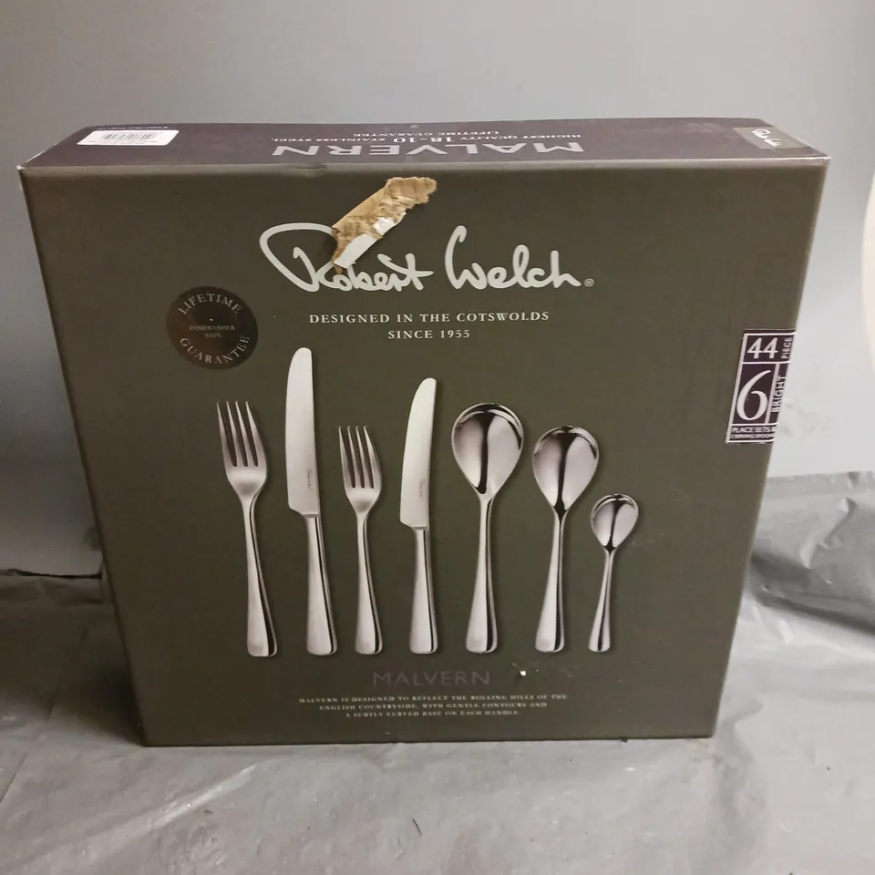 SEALED ROBERT WELCH 44-PEICE CUTLERY SET