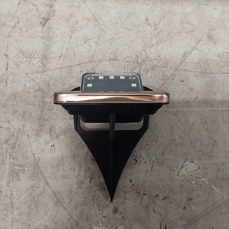 BOXED BELL & HOWELL BRONZE SOLAR PANEL LIGHTS SET OF APPROXIMATELY 8 (1 BOX)