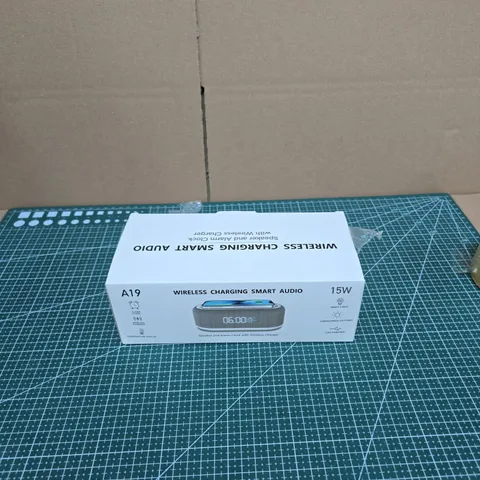 WIRELESS CHARGING SMART AUDIO SPEAKER WITH ALARM CLOCK – MODEL A19 (BOXED)