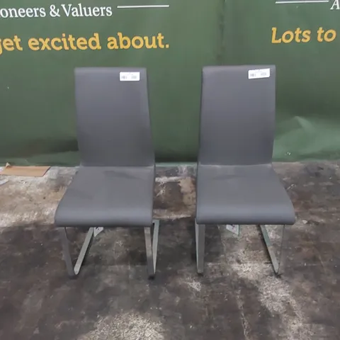 SET OF DESIGNER DINING CHAIRS IN PU LEATHER WITH CHROME LEGS