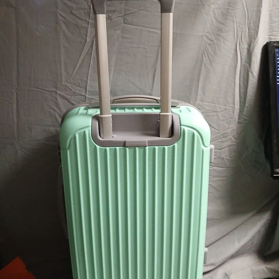 UNBRANDED MINT GREEN WHEELED HARD SHELL SUITCASE