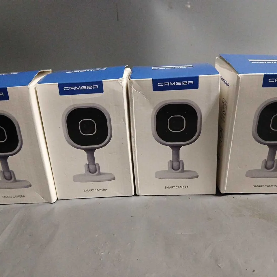 LOT OF 4 BOXED SMART CAMERAS