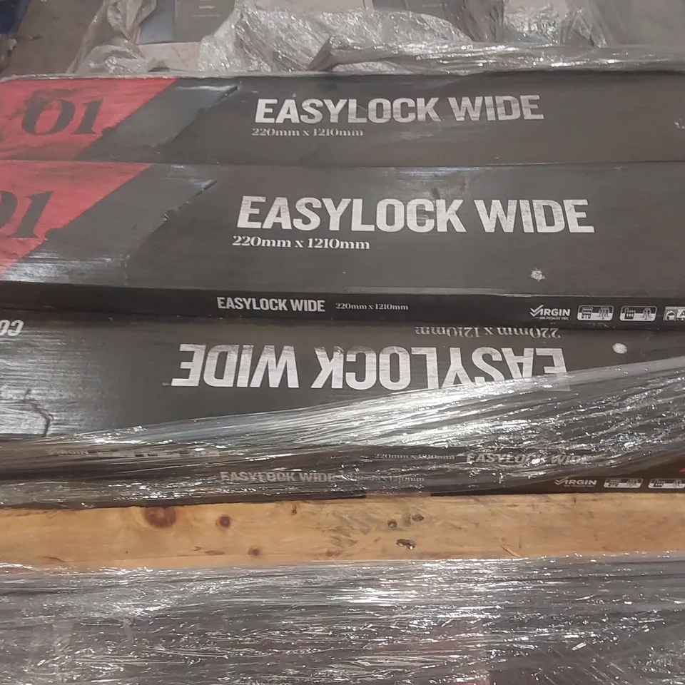 PALLET CONTAINING A VERY LARGE QUANTITY OF ASSORTED VINYL FLOORING INCLUDING: ELEEASE LIMESTONE, CONTESSE EASYLOCK WIDE GOLDEN OAK ACRYLIC ECT