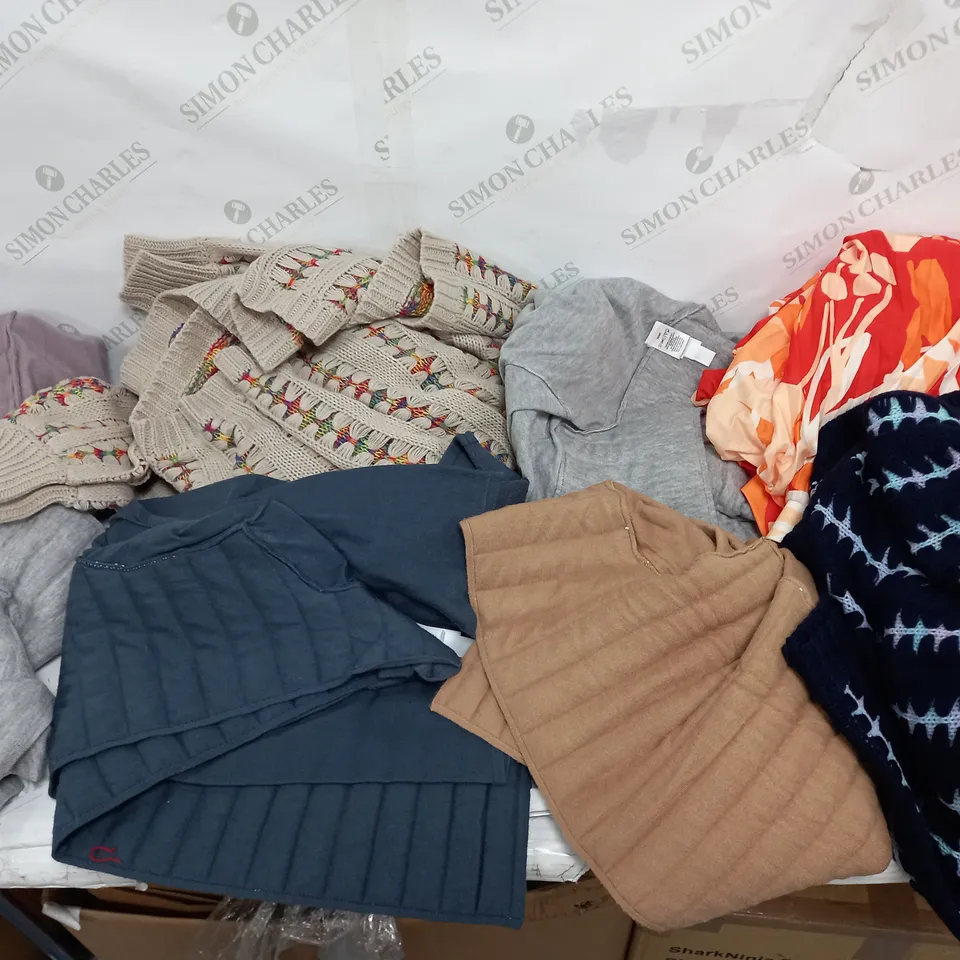 LARGE BOX OF ASSORTED CLOTHING ITEMS TOO INCLUDE TOPS , JUMPERS AND TROUSERS COMING IN DIFFERENT COLOURS AND SIZES 