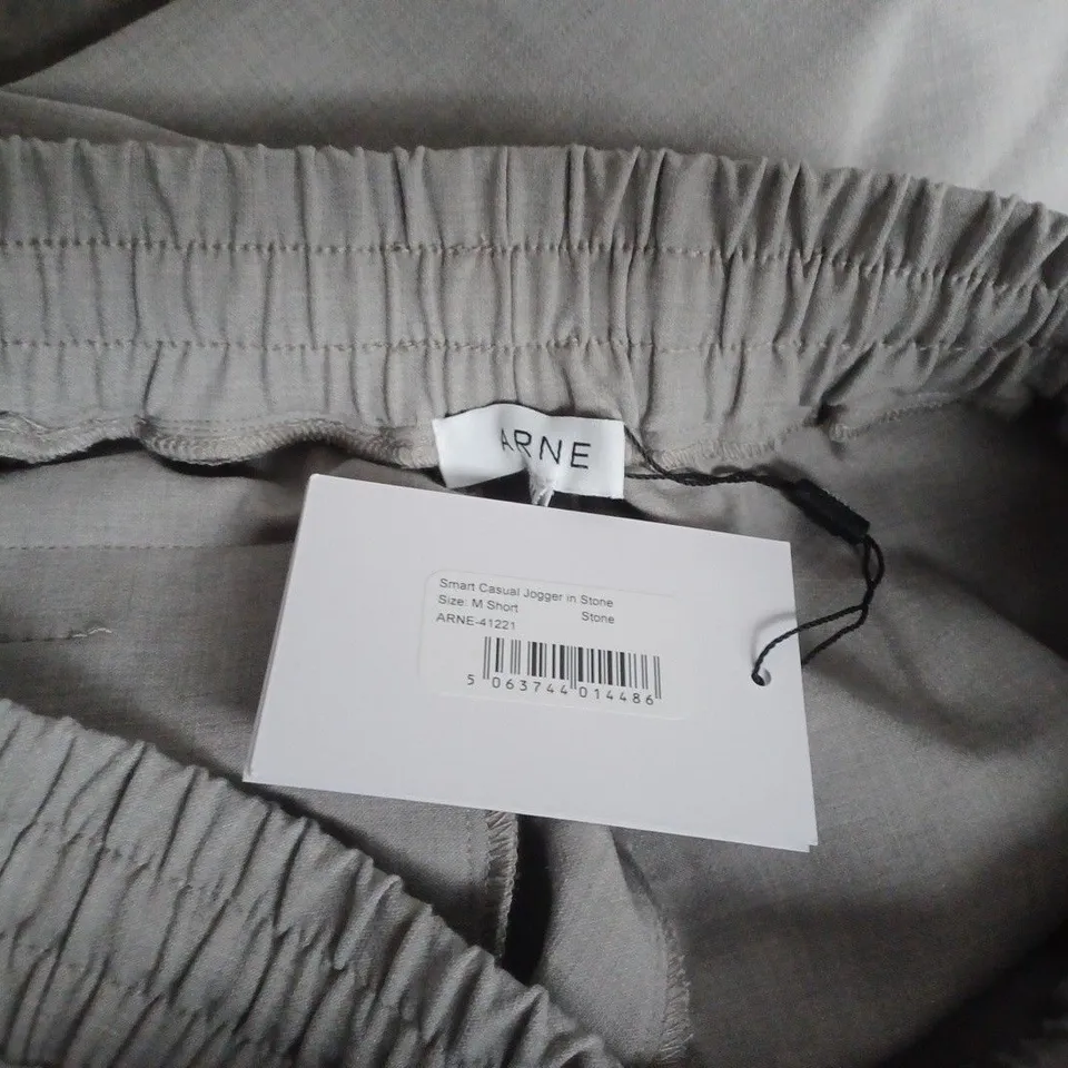 ARNE CASUAL JOGGER IN STONE – UK SIZE M (SHORT)