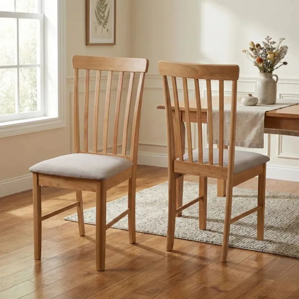 BOXED PAIR OF ANKRUM FARAH SOLID WOOD DINING CHAIRS - LIGHT OAK EFFECT
