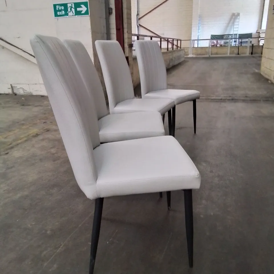 A QUALITY SET OF 4 FAUX LEATHER UPHOLSTERED CUSHIONED BACK DINING CHAIRS IN GREY