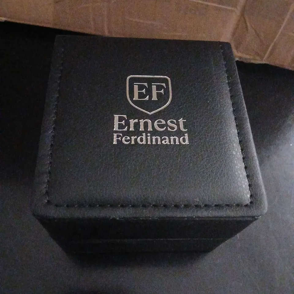 ERNEST FERDINAND QUARTZ WRISTWATCH – BLACK DIAL, GOLD-TONE CASE, LEATHER STRAP, BOXED
