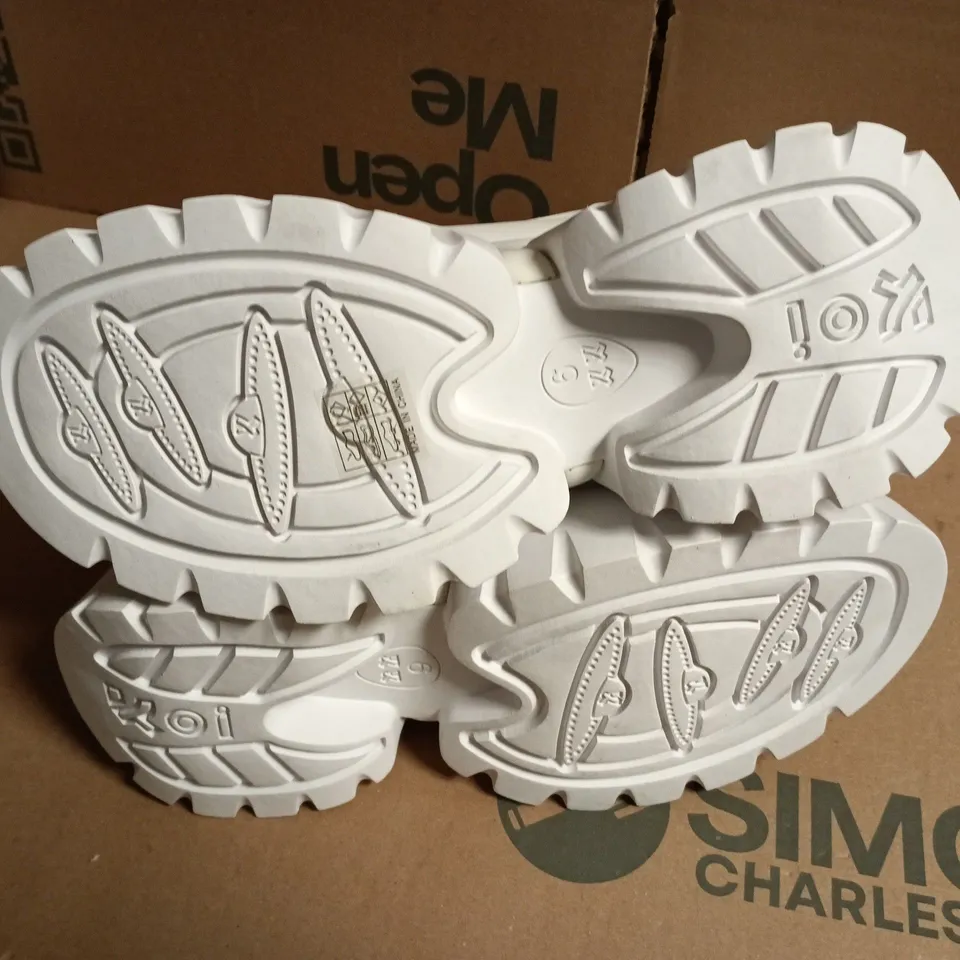 BOXED KOI RANCOR LACE UP MONSTER PLATFORM BOOTS IN WHITE, UK6