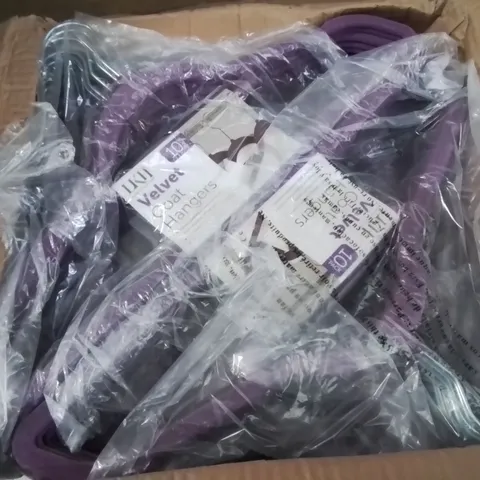 BOX CONTAINING APPROXIMATELY 100 BRAND NEW PURPLE VELVET CLOTHES HANGERS