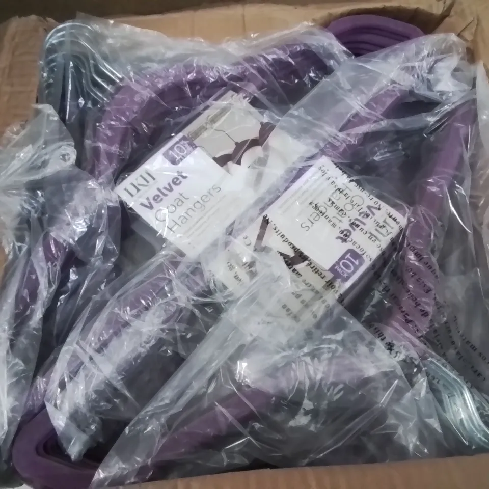 BOX CONTAINING APPROXIMATELY 100 BRAND NEW PURPLE VELVET CLOTHES HANGERS