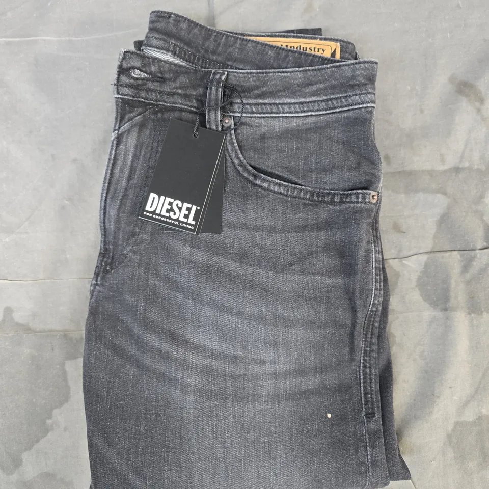 DIESEL JEANS IN BLACK SIZE 32