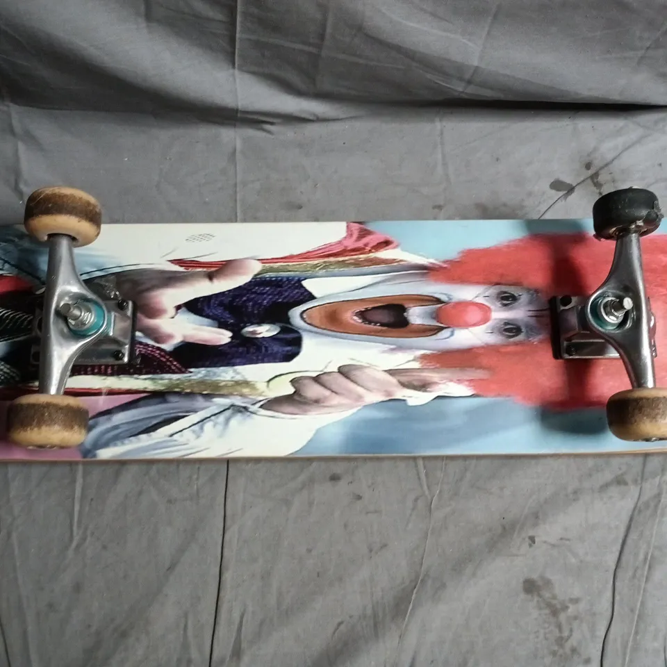 UNBRANDED SKATEBOARD WITH CLOWN GRAPHIC DECK