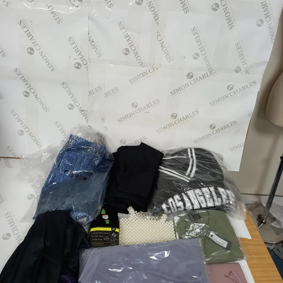 LARGE BOX OF ASSORTED CLOTHING ITEMS IN VARIOUS COLOURS AND SIZES INCLUDING TROUSERS , TOPS AND JUMPERS 