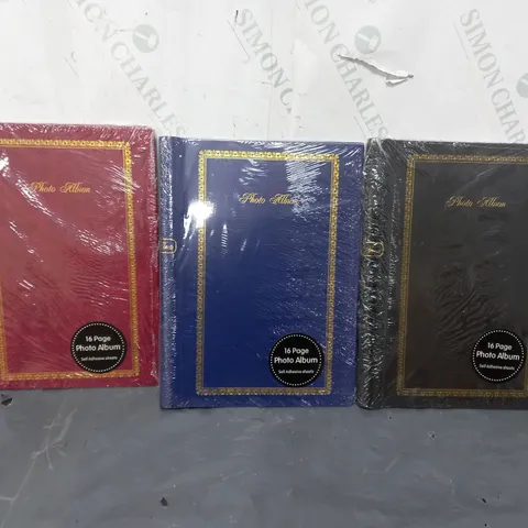 APPROXIMATELY 42 ASSORTED 16 PAGE PHOTO ALBUMS IN VARIOUS COLOURS