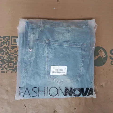 BAGGED FASHION NOVA SHOCK AND AWE VINTAGE TINTED BAGGY JEANS IN BLUE SIZE 15