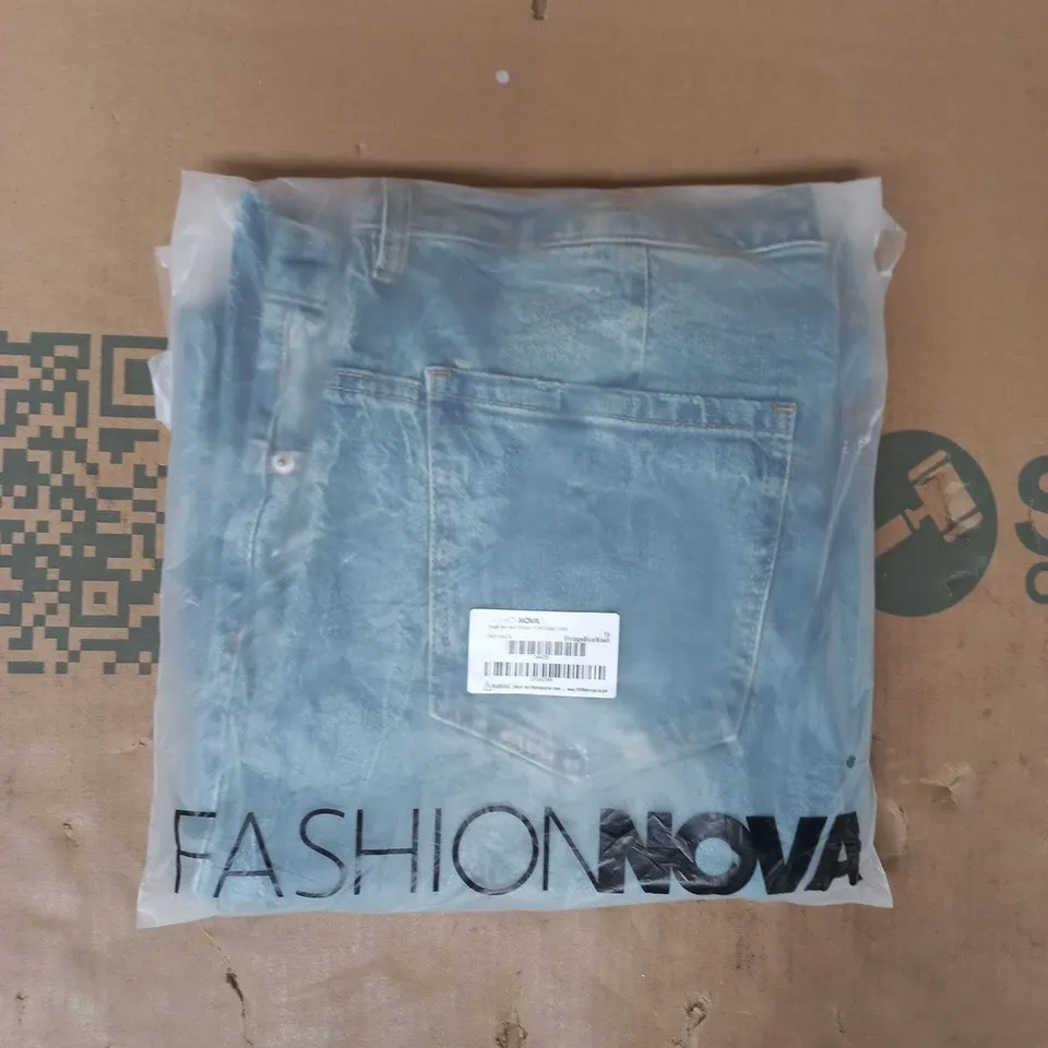 BAGGED FASHION NOVA SHOCK AND AWE VINTAGE TINTED BAGGY JEANS IN BLUE SIZE 15