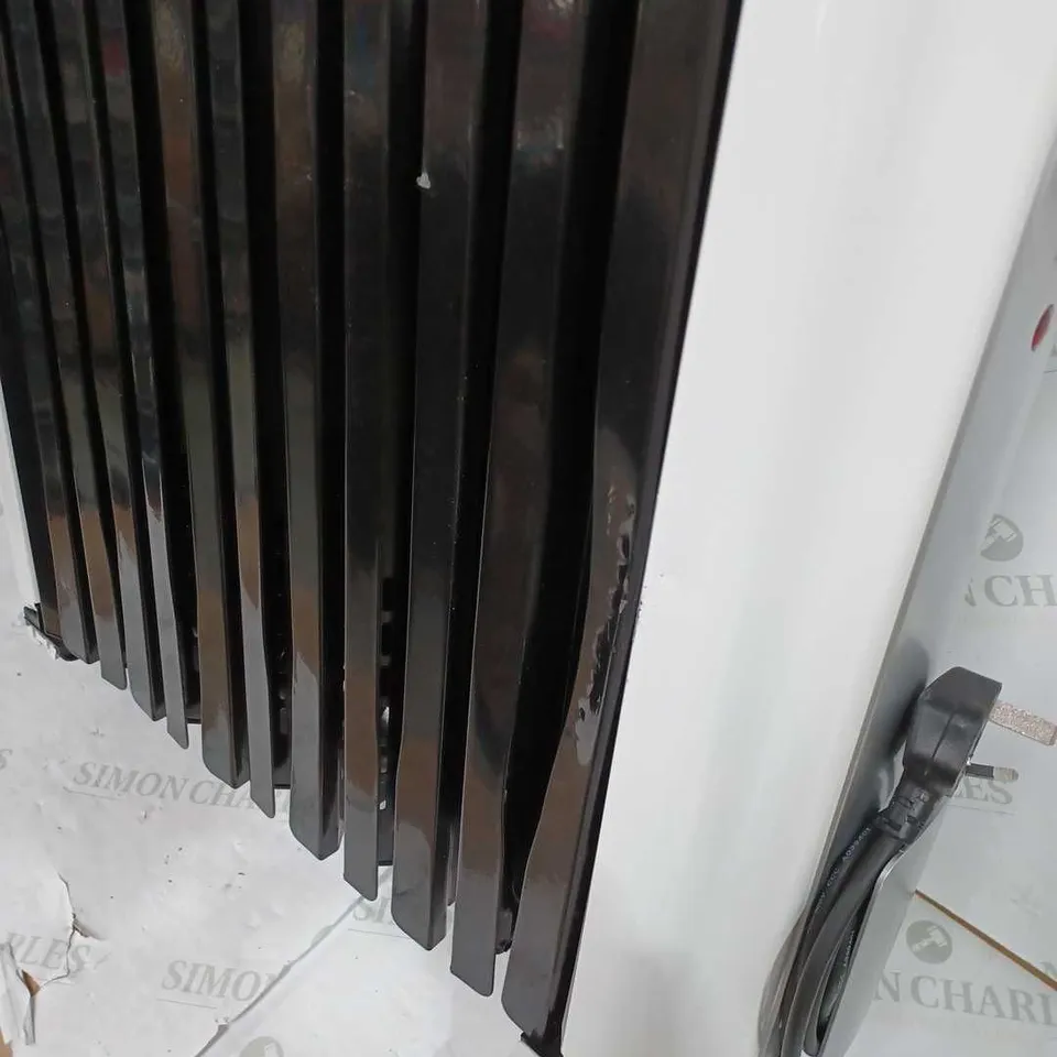 JOHN LEWIS RADIATOR IN BLACK & WHITE 