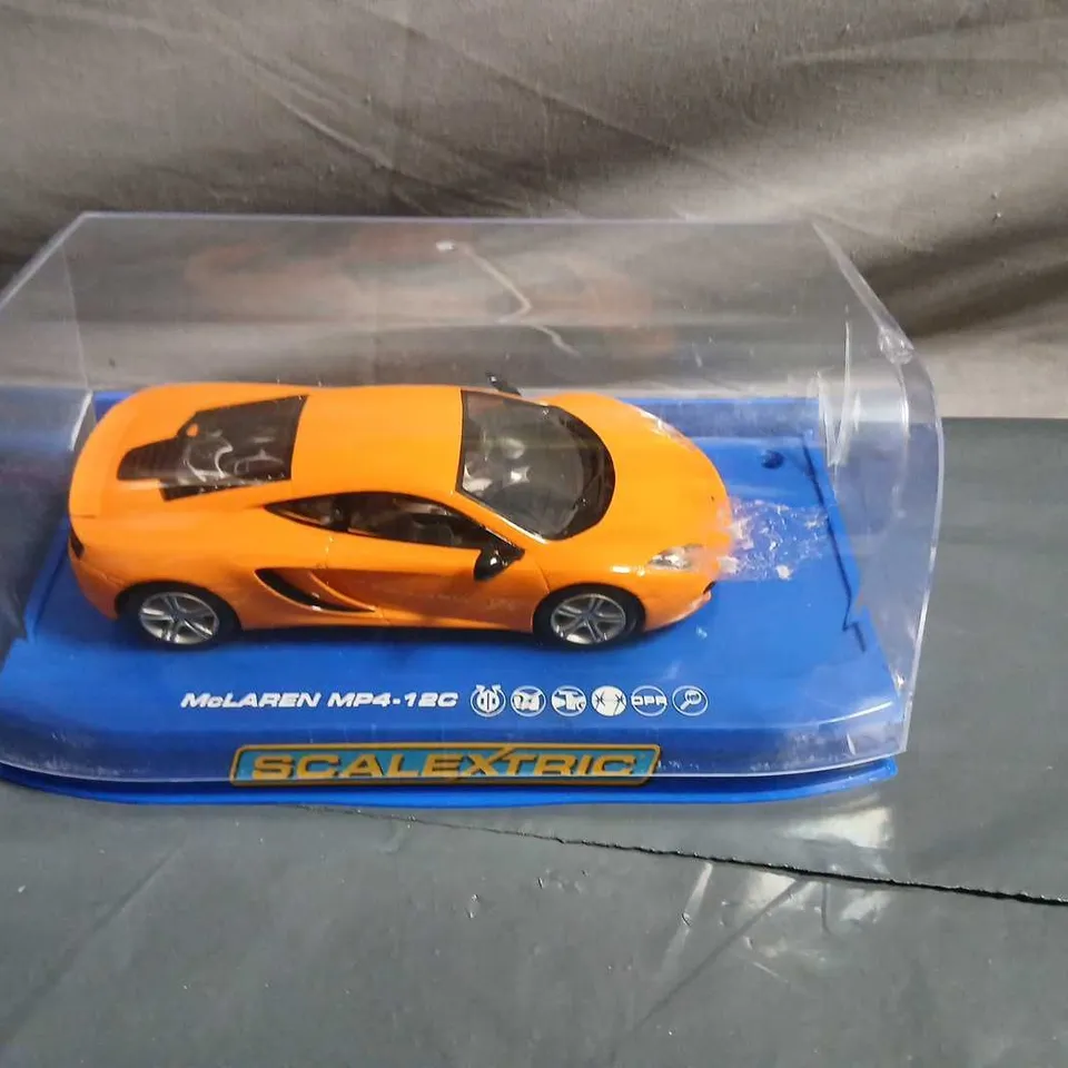 SCALEXTRIC MCLAREN MP4-12C SLOT CAR – ORANGE, WITH DISPLAY CASE