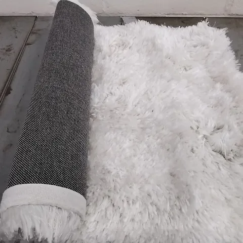 BRAND NEW BUCCI SOFTWARE FLUFFY HAND TUFTED CREAM RUG - 60CM X 100CM