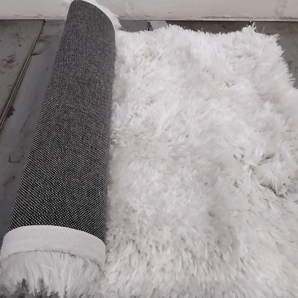 BRAND NEW BUCCI SOFTWARE FLUFFY HAND TUFTED CREAM RUG - 60CM X 100CM 