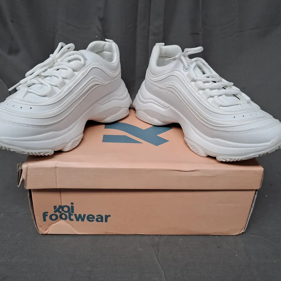BOXED PAIR OF KOI EXTRA CHUNKY TRAINERS IN WHITE SIZE 7