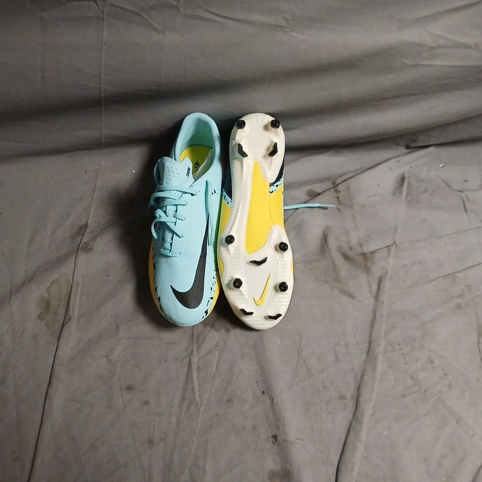 NIKE PHANTOM FOOTBALL BOOTS – TURQUOISE UPPER, BLACK SWOOSH, YELLOW OUTSOLES