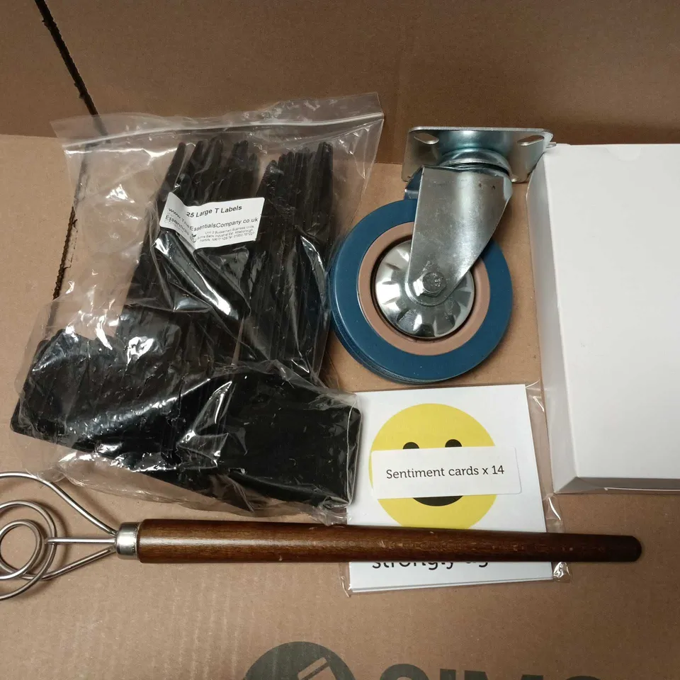 APPROXIMATELY 12 ASSORTED HOUSEHOLD ITEMS TO INCLUDE WHEELS, SENTIMENT CARDS, LARGE T LABELS, ETC