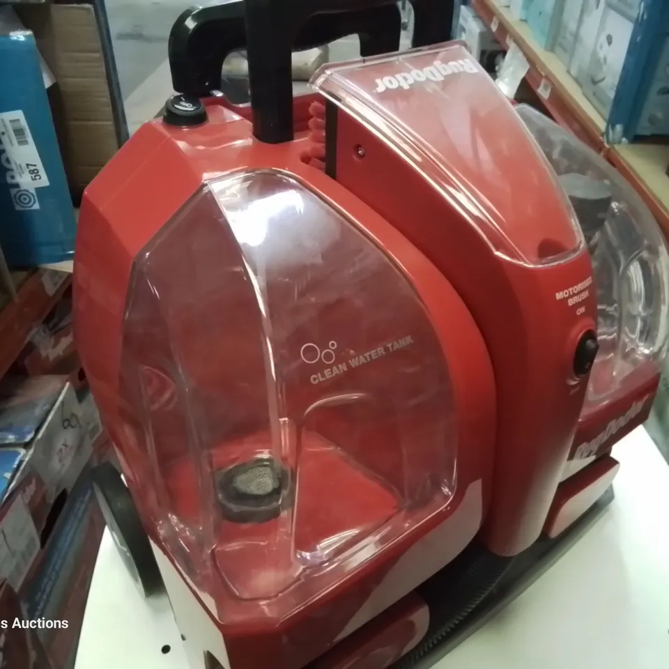 BOXED RUG DOCTOR PORTABLE SPOT CLEANER