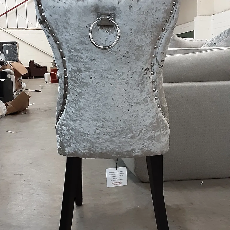 ONE CRUSHED VELVET DINING CHAIR WITH A STUDDED BORDER 