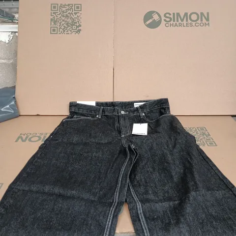 BERSKHA SUPER BAGGY BLACK JEANS UK 36 TAGGED