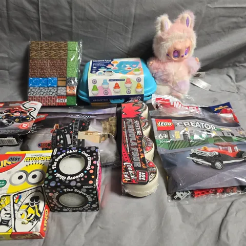 TOTE OF APPROXIMATELY 10 ASSORTED TOYS AND GAMES TO INCLUDE TEDDIES, LEGO AND UNO CARDS