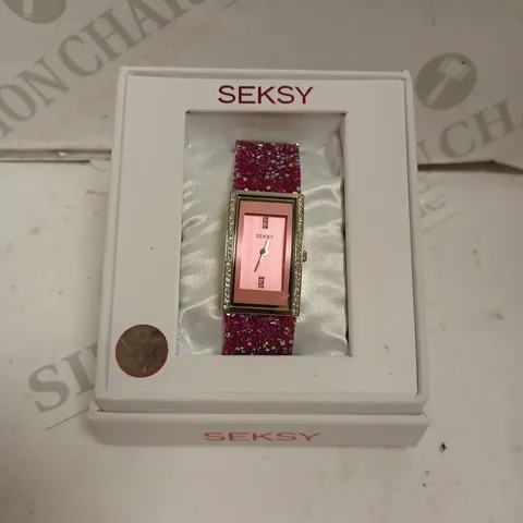 BOXED SEKSY BY SEKONDA LADIES STONE SET WATCH WITH STAINLESS STEEL BACK - JAPAN MOVEMENT.