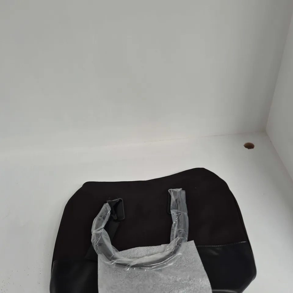 MILLION NIGHT ELIXIR WEEKEND BAG – BLACK, IN PLASTIC