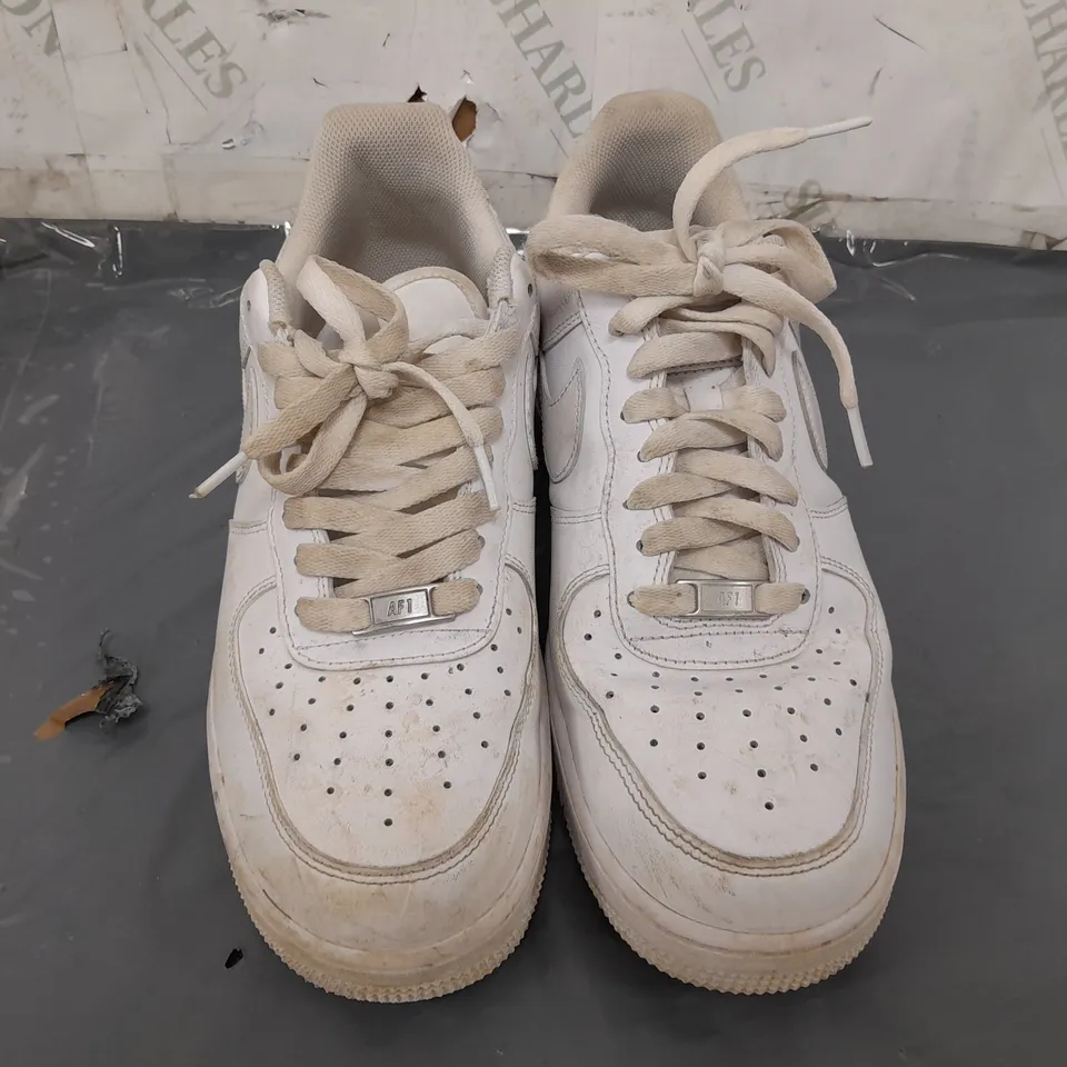 PAIR OF NIKE AIR FORCE TRAINERS IN WHITE (ODD SIZES - 1 SIZE UK 8, 1 SIZE UK 9)