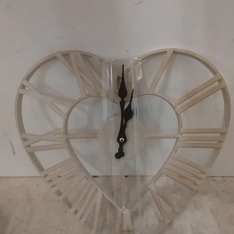 BOXED WIDDOP AND CO HEART WALL CLOCK 