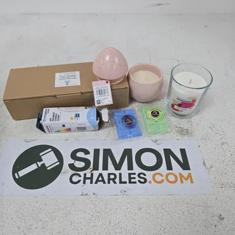 APPROXIMATELY 12 ASSORTED HOUSEHOLD ITEMS TO INCLUDE scented candles, wax melts, bulbs, ETC - COLLECTION ONLY