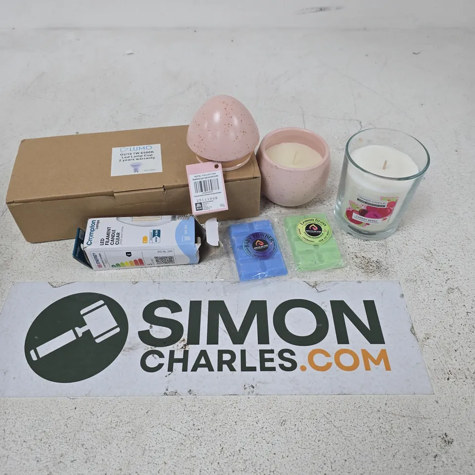APPROXIMATELY 12 ASSORTED HOUSEHOLD ITEMS TO INCLUDE scented candles, wax melts, bulbs, ETC - COLLECTION ONLY