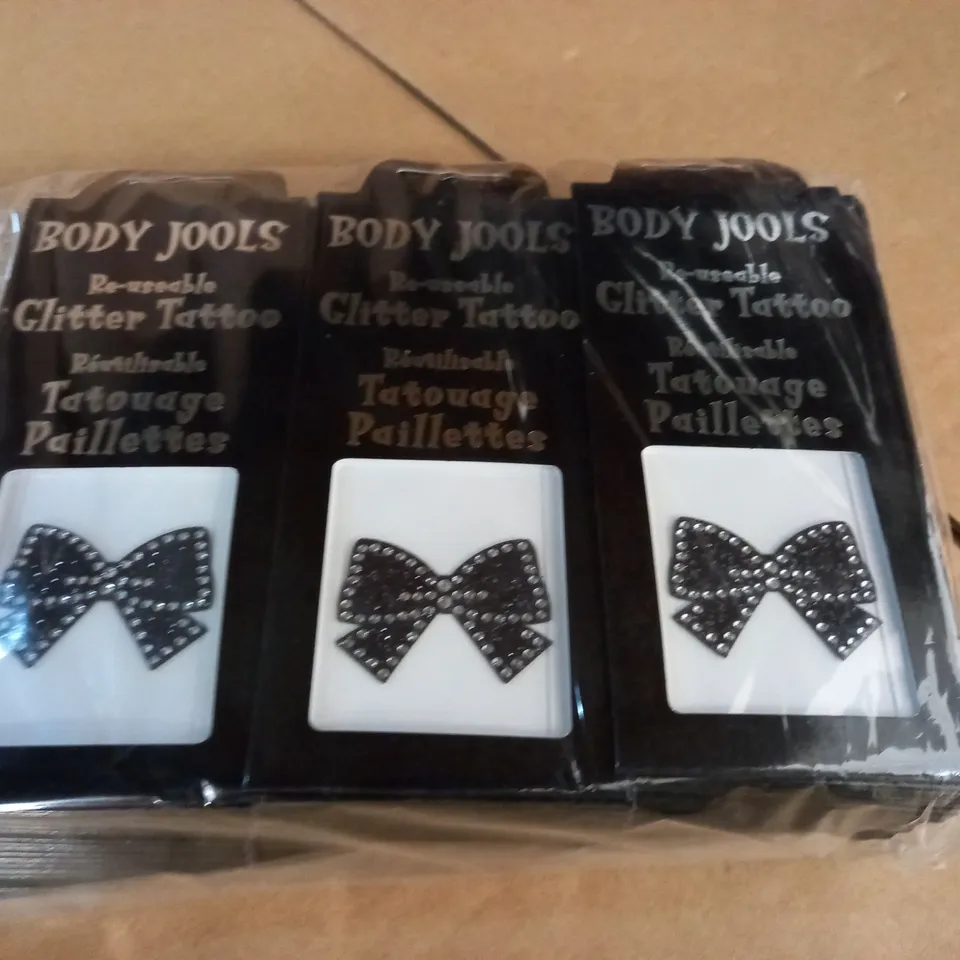 LOT OF APPROXIMATELY 95 BOW THEMED BODY JOOLS REUSABLE GLITTER TATTOOS 