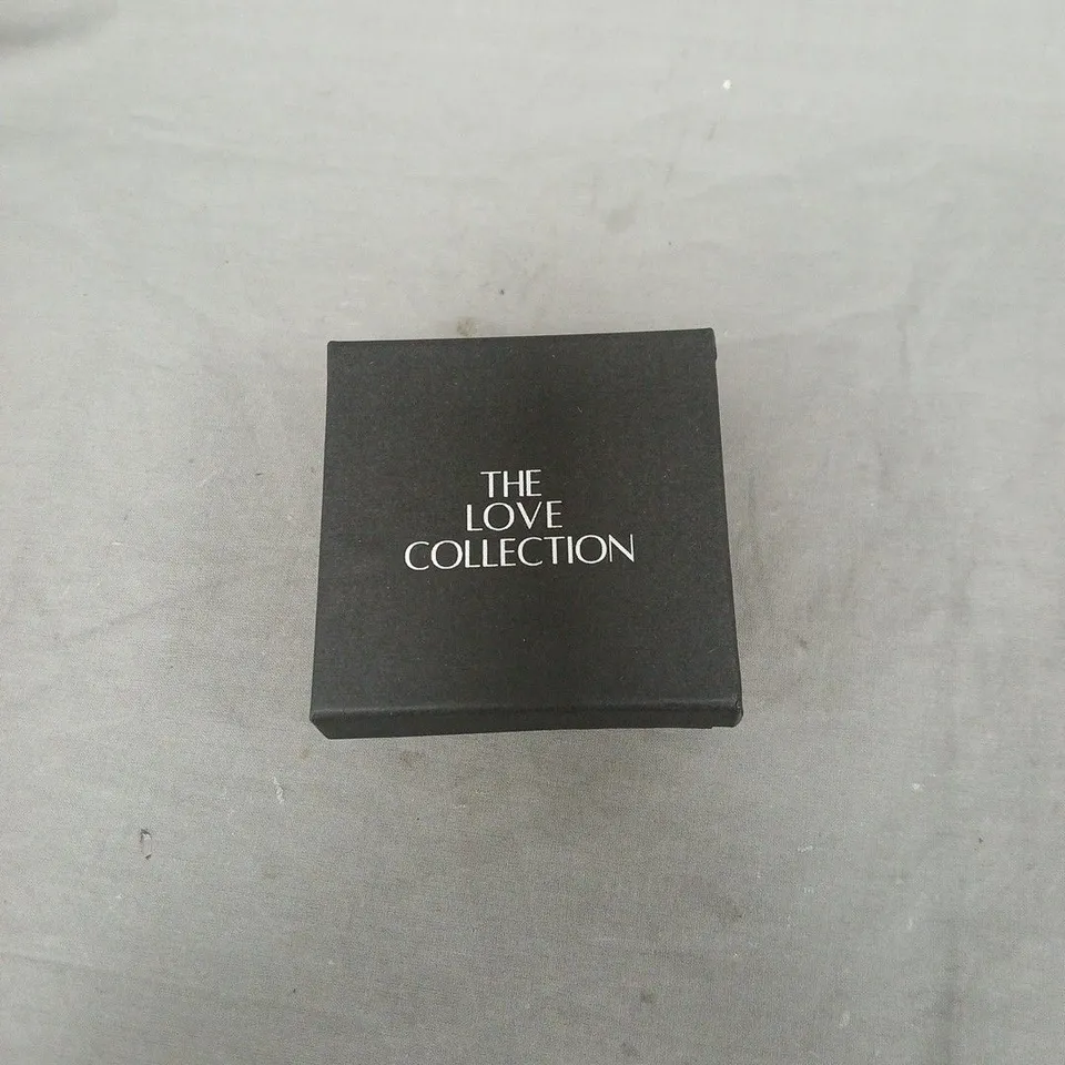 THE LOVE COLLECTION STERLING SILVER TINY STAR SHAPED NOSE STUD