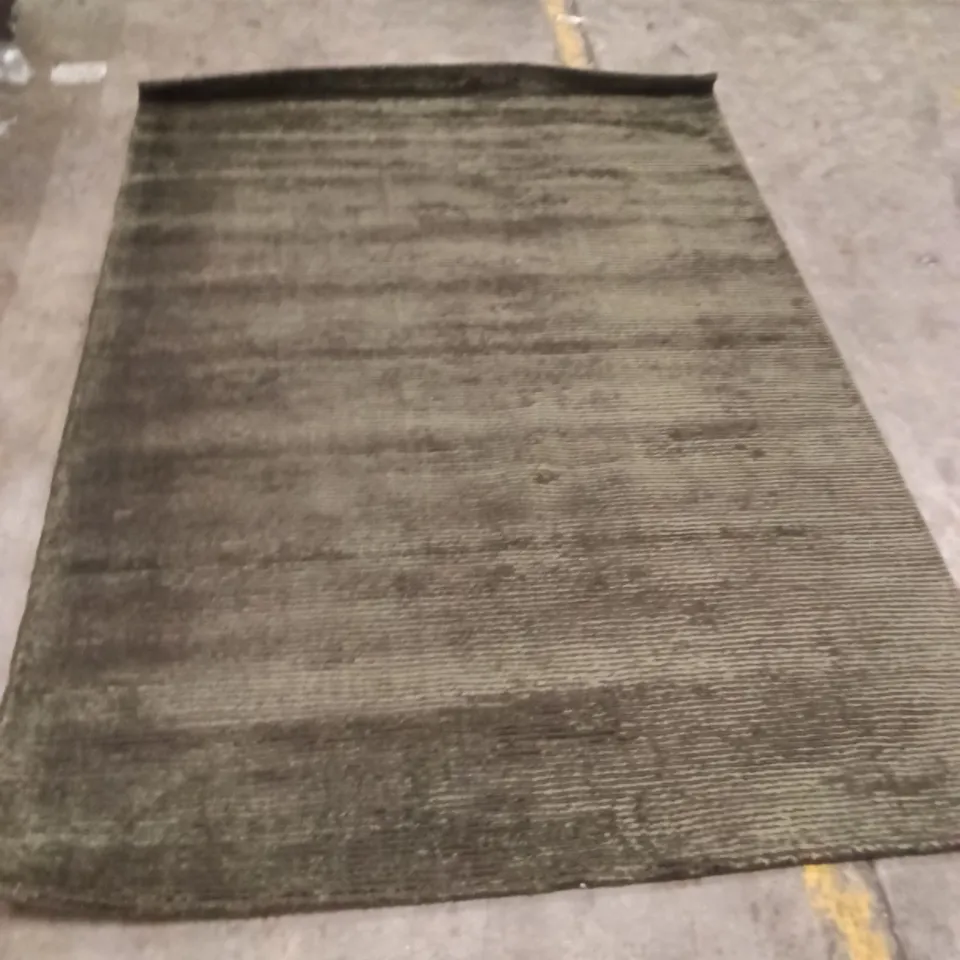 STILLAGE CONTAINING DESIGNER AREA RUGS APPROXIMATELY 15 RUGS 