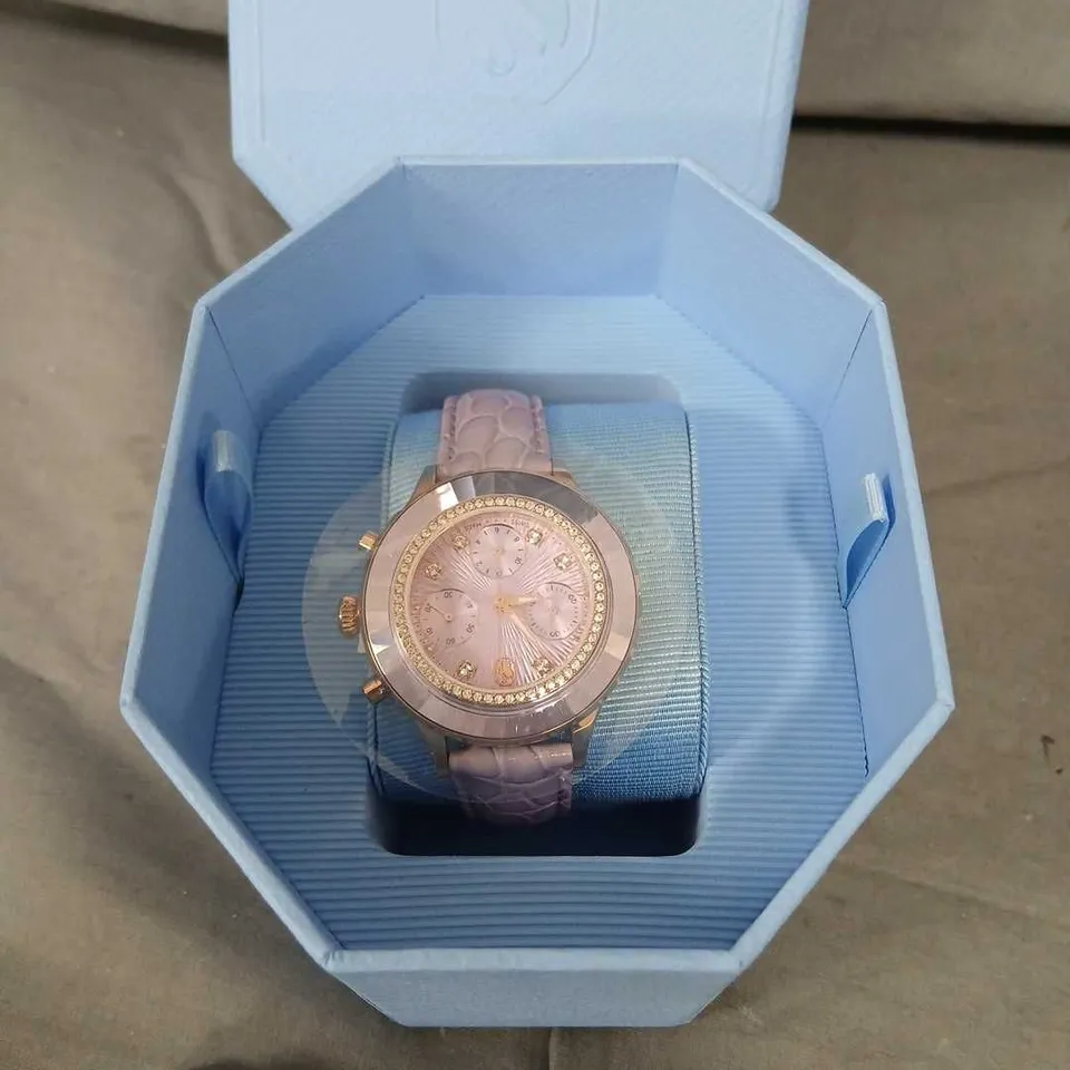 SWAROVSKI LADIES ROSE GOLD-TONE CHRONOGRAPH WATCH WITH PINK DIAL AND PINK TEXTURED STRAP IN BLUE PRESENTATION BOX