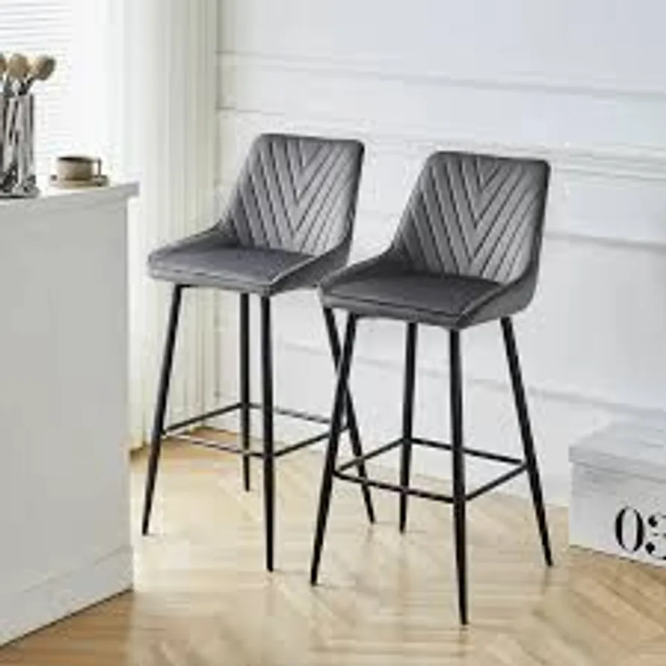 A BOXED PAIR OF GREY VELVET UPHOLSTERED DINING CHAIRS/STOOLS