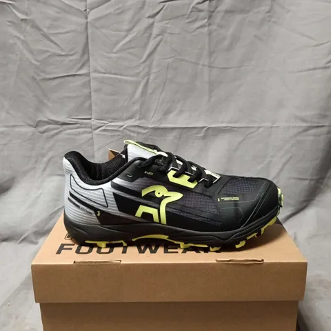 BOXED PAIR OF  KOOKABURRA ROGUE JUNIOR HOCKEY SHOES – BLACK/YELLOW, UK 4 (EU 37)