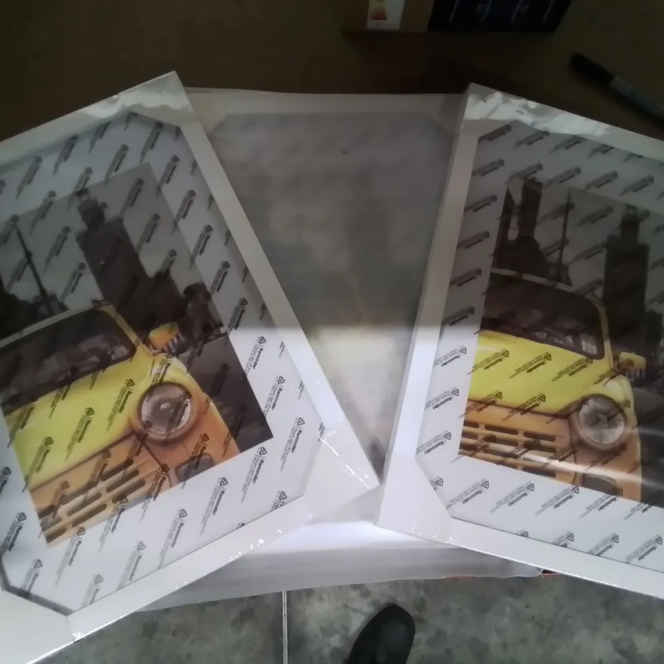 A BOX OF 3 PICTURE FRAMES SIZE UNSPECIFIED IN WHITE