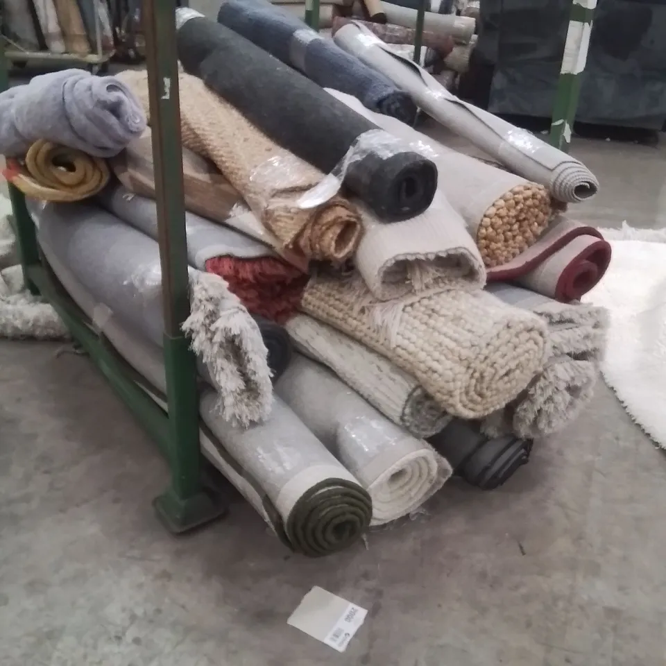 STILLAGE OF APPROXIMATELY 20 QUALITY DESIGNER RUGS