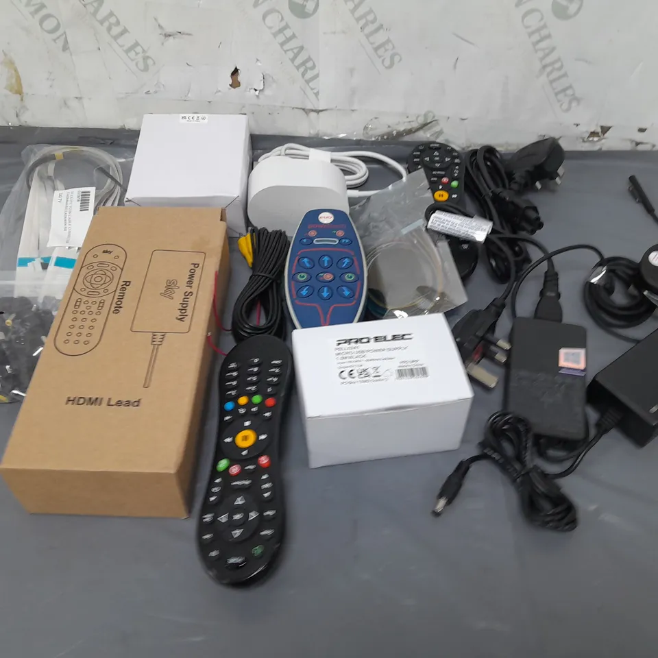 LOT OF ASSORTED HOUSEHOLD ITEMS TO INCLUDE REMOTE CONTROLS, CABLES AND ADAPTORS