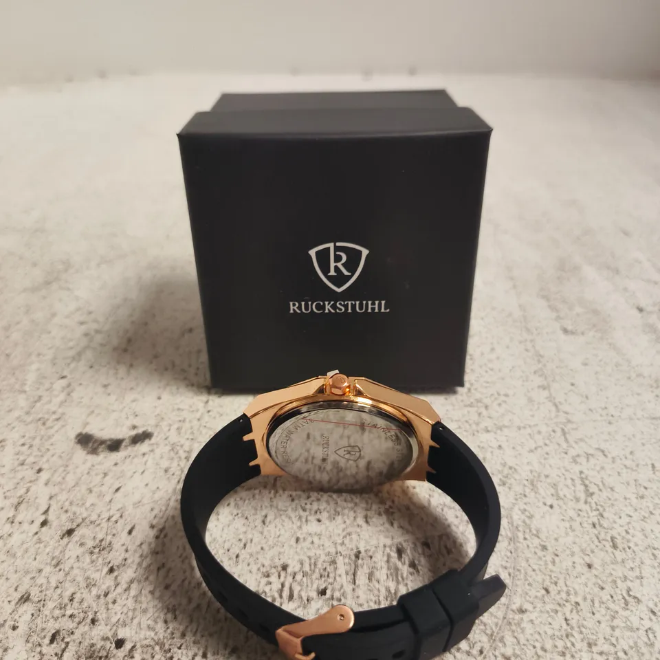 RUCKSTUHL ROSE GOLD-TONE OCTAGONAL CASE WRISTWATCH, BLACK RUBBER STRAP – BOXED
