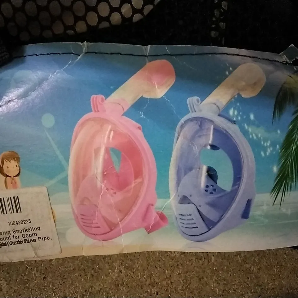 A BOX OF 6 KIDS FREE BREATH SNORKELING MASKS AND 5 PAIRS OF PADDED PROTECTIVE SHORTS